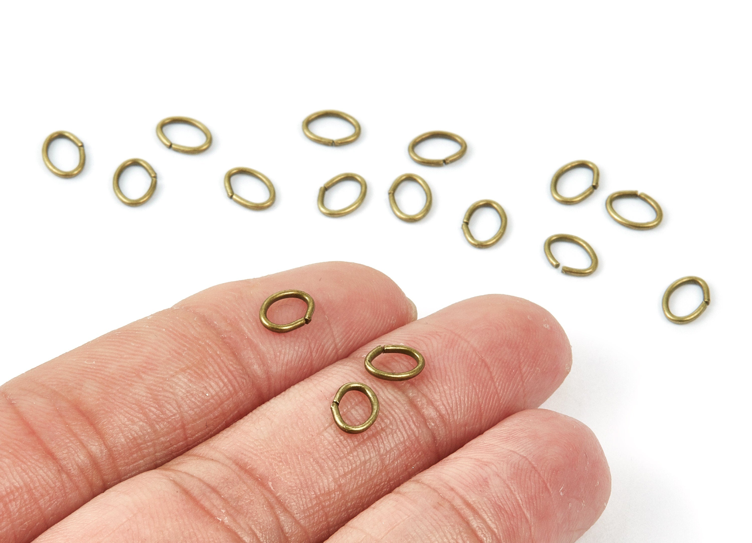 Brass Open Jump Rings - 7x5x0.9mm - Antique Bronze Tone Plated - Brass Open Jump Rings - Jewelry Supplies - PP1563AB - DOMEDBAZAAR