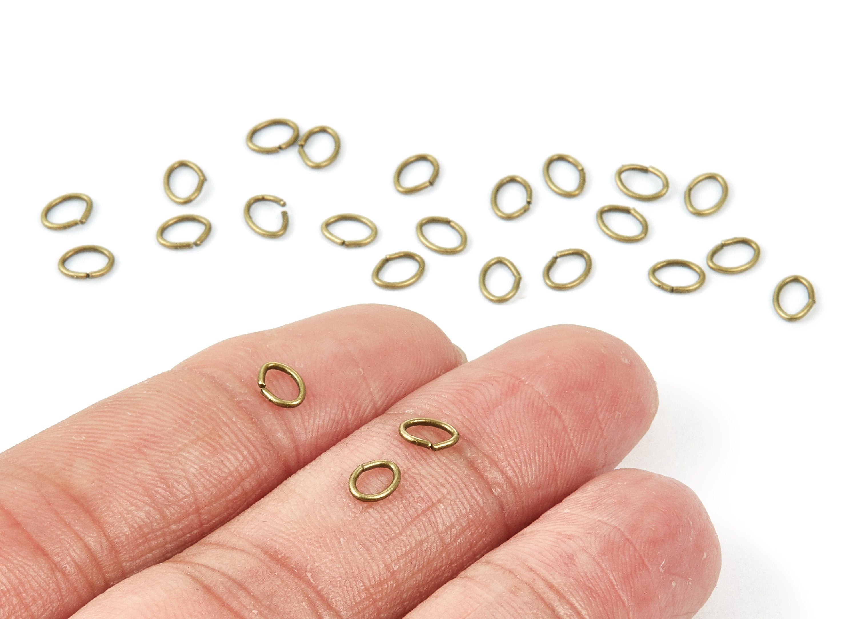 Brass Open Jump Rings - 5x4x0.7mm - Antique Bronze Tone Plated - Brass Open Jump Rings - Jewelry Supplies - PP1564AB - DOMEDBAZAAR