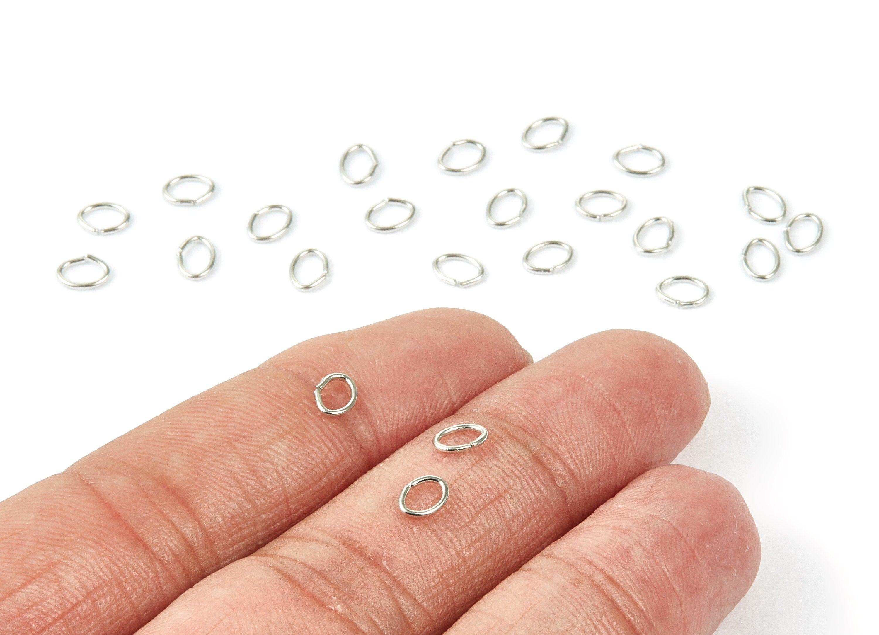 Brass Open Jump Rings - 5x4x0.7mm - Silver Tone Plated - Brass Open Jump Rings - Jewelry Supplies - PP1564S - DOMEDBAZAAR