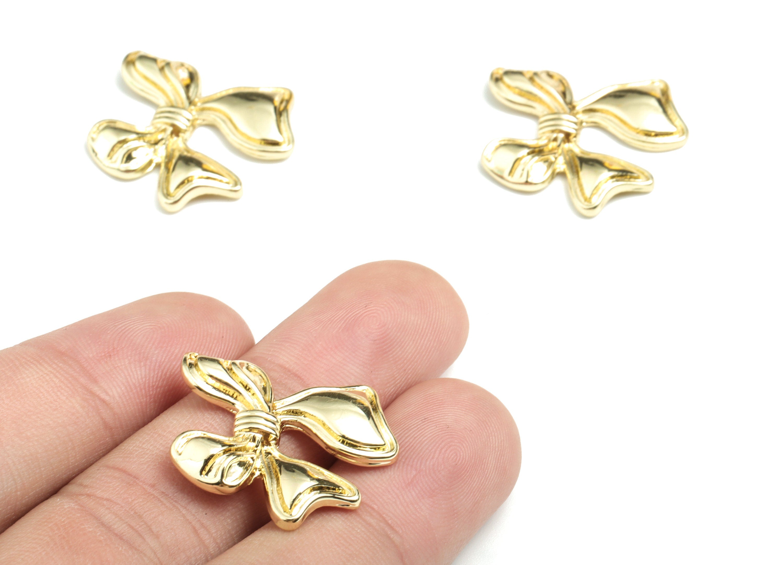 Alloy Bowtie Earring Charms - Gold Alloy Bowtie Pendant - Gold Tone Plated Alloy - Jewelry Supplies - 23.99x22.45x3.5mm - ZZ1725 - DOMEDBAZAAR